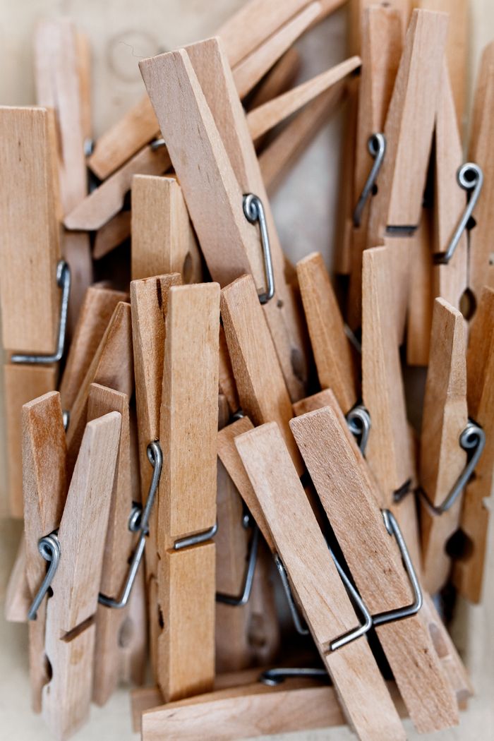A collection of wooden clothespins perfect for arts and crafts projects. Ideal for creative and home use.